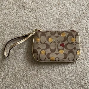 Coach heart and gold wristlet